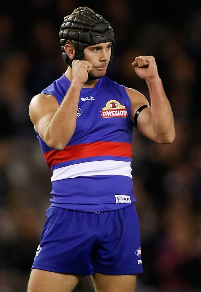 AFL 2015 Rd 14 - Western Bulldogs v Carlton MELBOURNE, AUSTRALIA - JULY 4: Debutant Caleb Daniel of the Bulldogs celebrates his first AFL goal during the 2015 AFL round 14 match between the Western Bulldogs and the Carlton Blues at Etihad Stadium, Melbourne, Australia on July 4, 2015. (Photo by Adam Trafford/AFL Media)